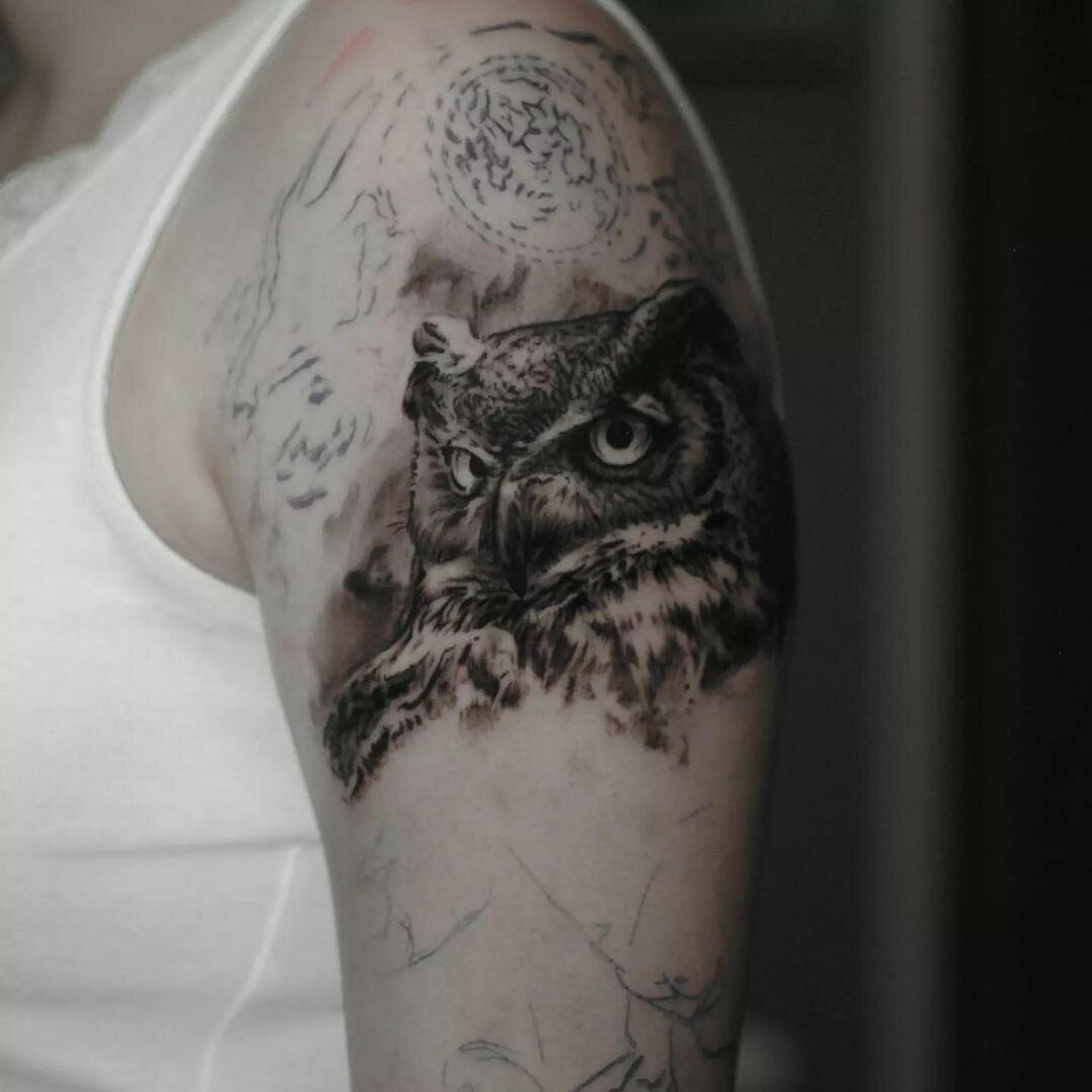 Inksearch tattoo Marcin Nencek Grey eye Tattoo