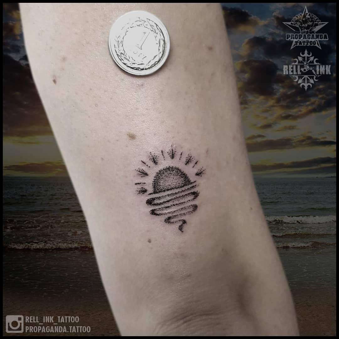 Inksearch tattoo Rell - Propaganda Tattoo